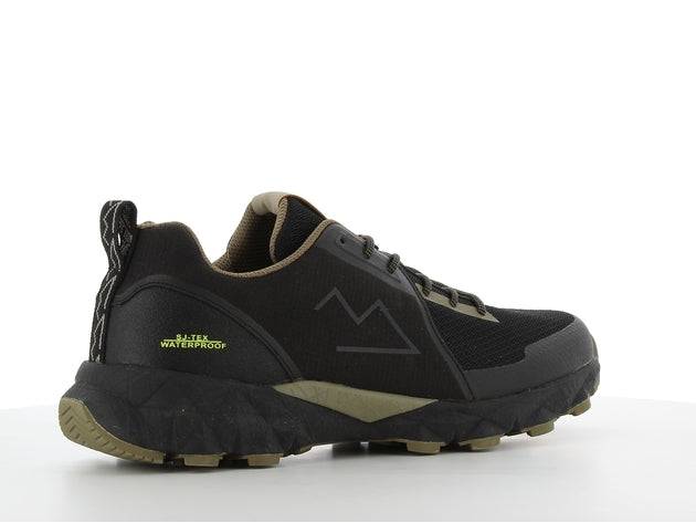 Chaussure randonnée TAMAN noire avec logo discret et talon renforcé, parfaite pour confort et polyvalence en terrain varié.