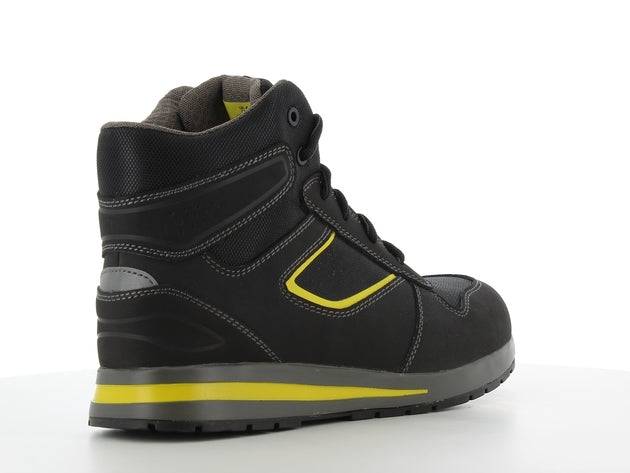 Chaussure de sécurité SPEEDY S3S mi-haute noire avec détails jaunes, semelle antidérapante SR et résistante à la chaleur, idéale pour le BTP.