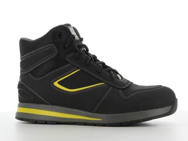 Chaussure de sécurité SPEEDY S3S mi-haute noire avec détails jaunes, semelle antidérapante SR et résistante à la chaleur, idéale pour le BTP.